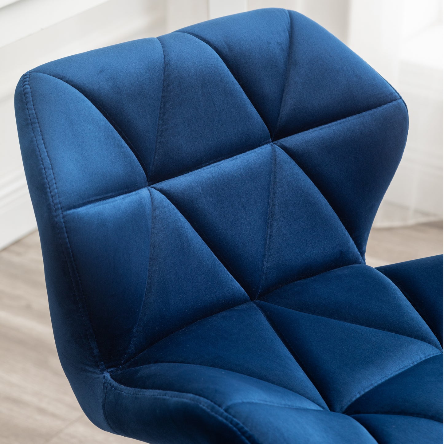 Eda Modern Tufted Swivel Chair