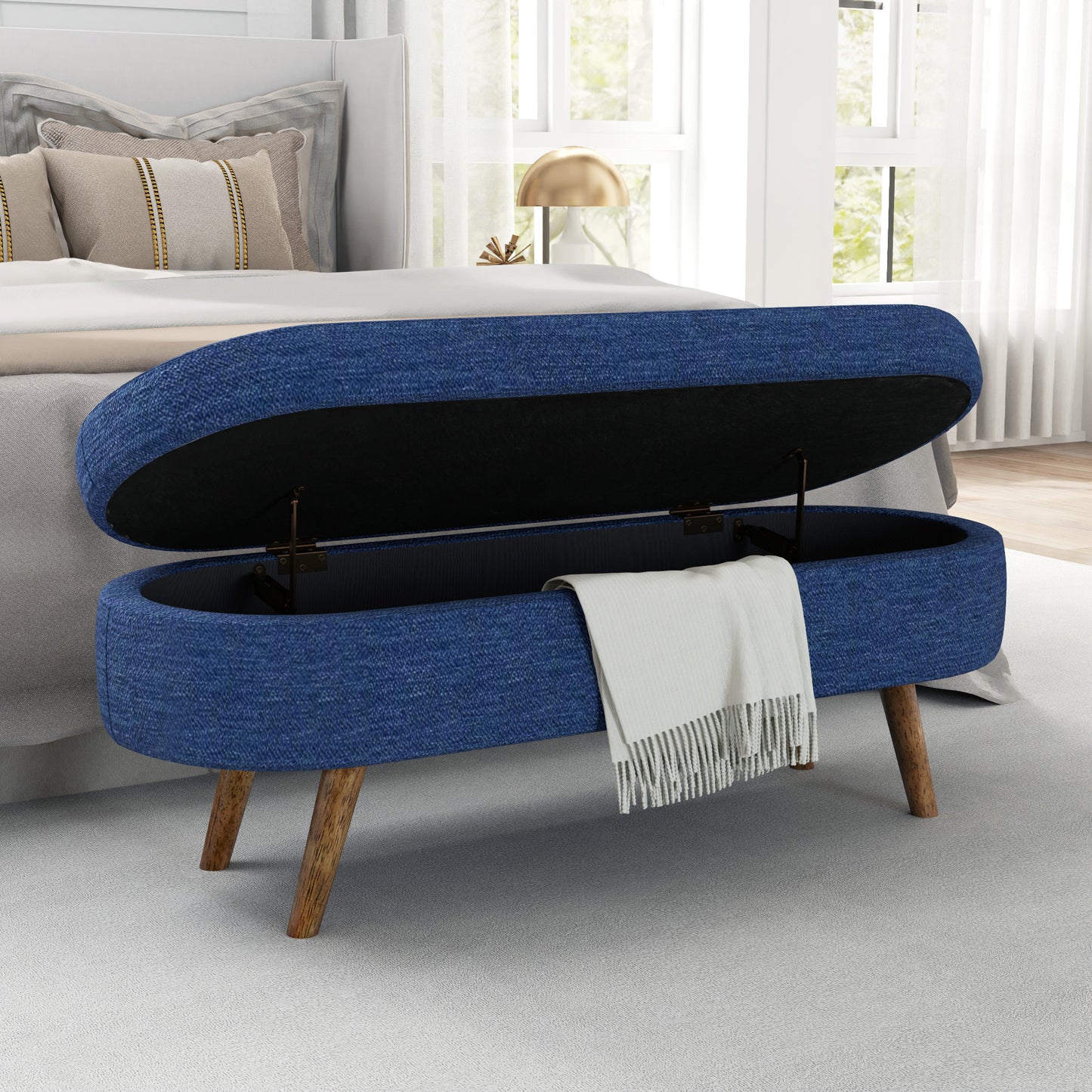 Emery Contemporary Oval Velvet Storage Ottoman